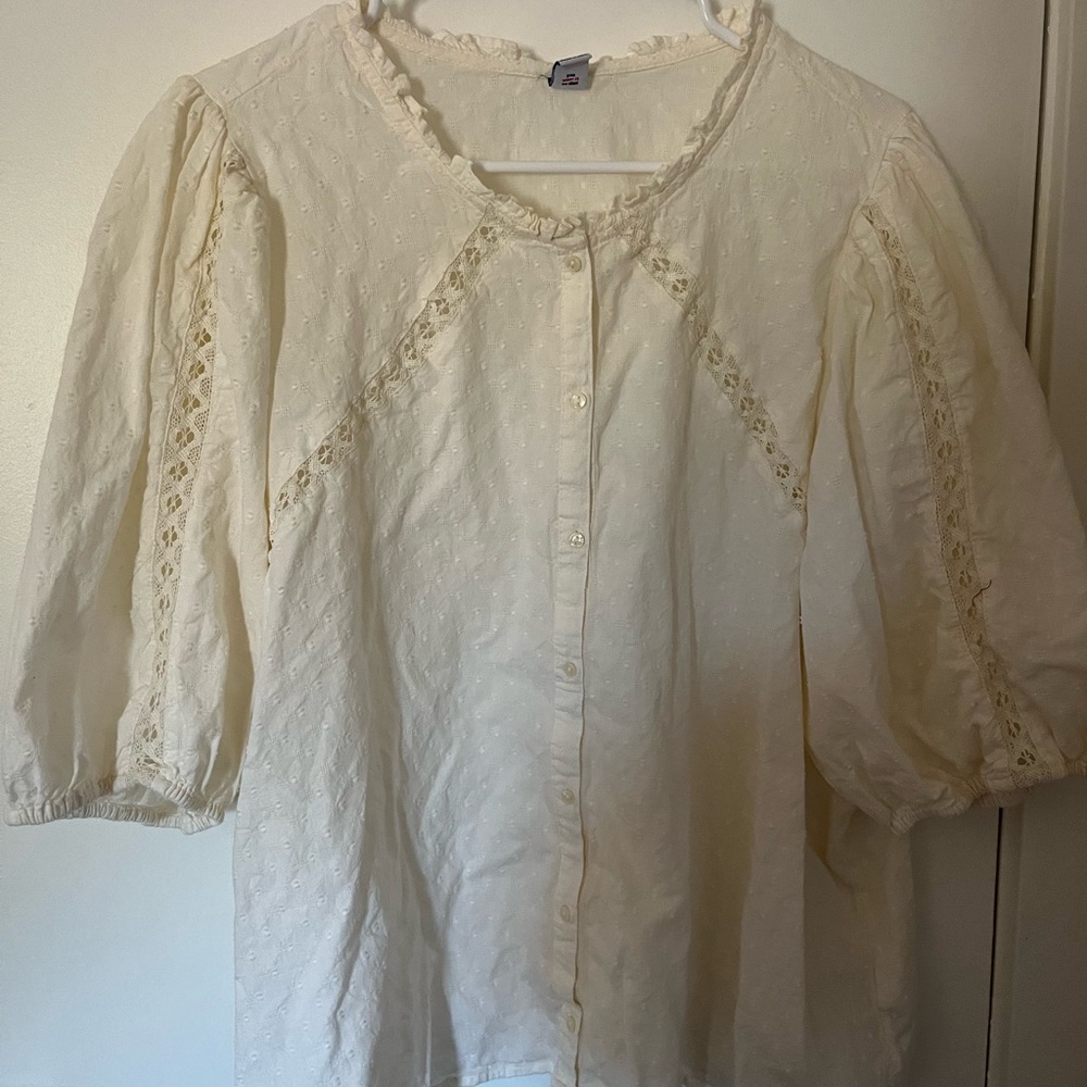 Puffed sleeves off white blouse